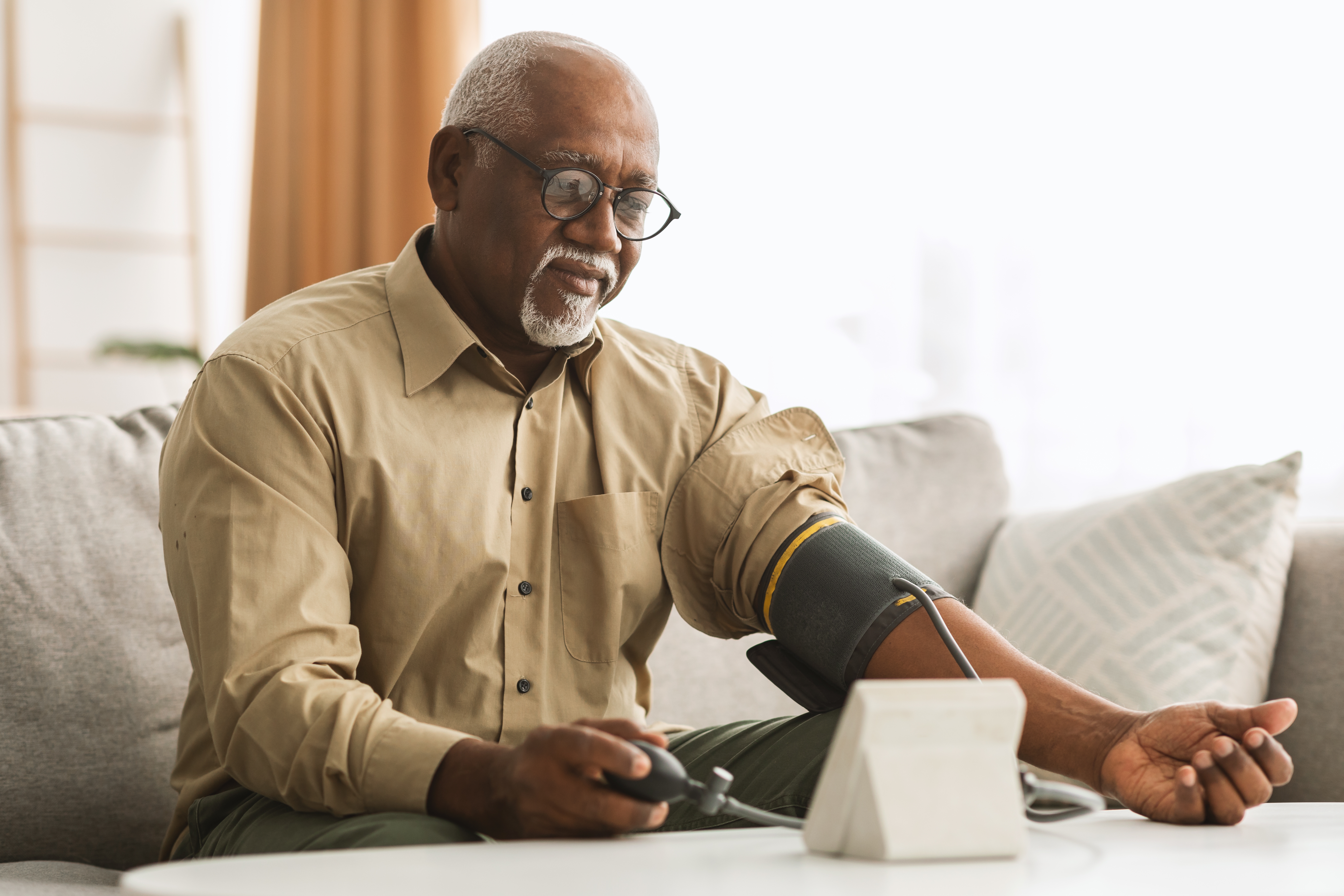 Man taking blood pressure reading