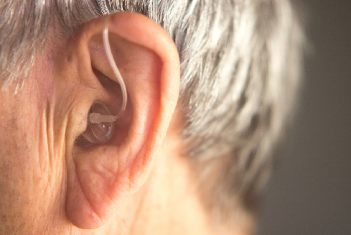 A person wearing a hearing aid
